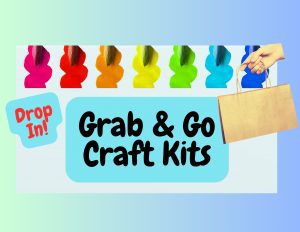 Grab & Go Craft Kits sign with the words Drop In! Multi-colored paint brushes in the background with a hand holding a take-away paper bag.