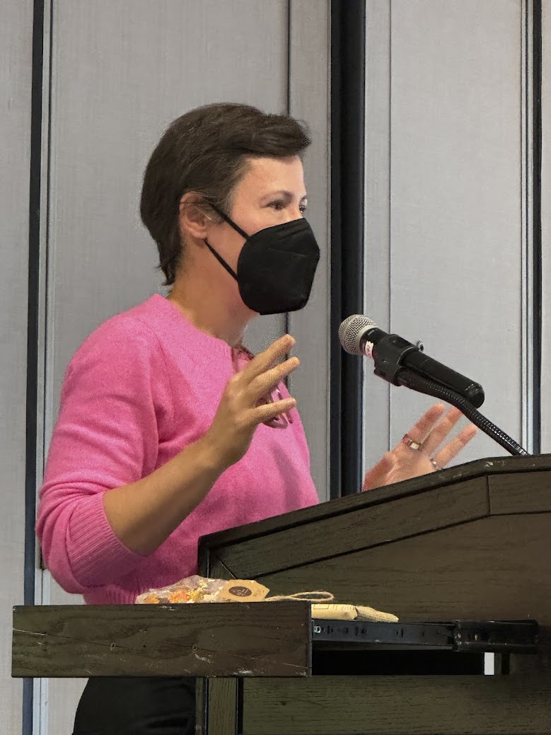 Ann Napolitano speaking at a podium