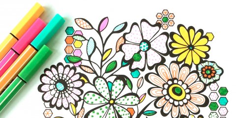 Partially colored coloring page with pens.