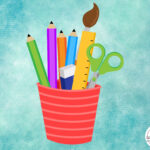 A cup holding art supplies.