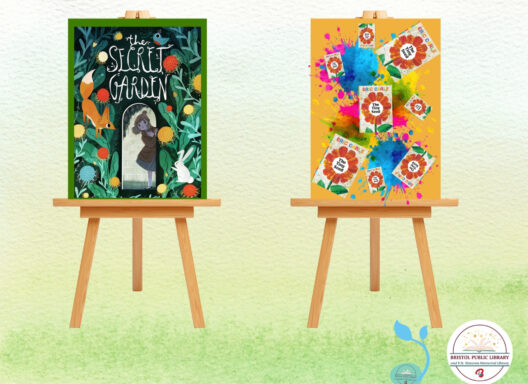 Two art works showcasing book cover art on easels.