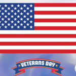 An American flag and a Veterans Day banner.